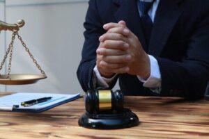 A truck accident lawyer sitting at his desk waiting to file a lawsuit
